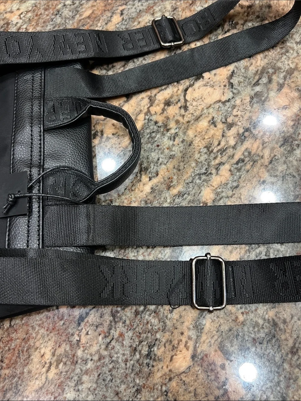 NWT’S Botkier New York Trigger Mini Backpack in sleek black & Faux Leather Trim